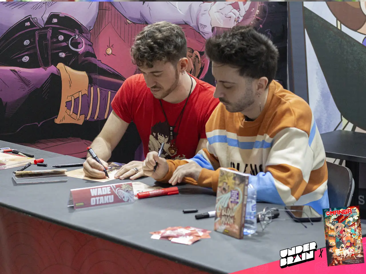Wade Otaku y Drawill firmando durante el 28 Manga BCN