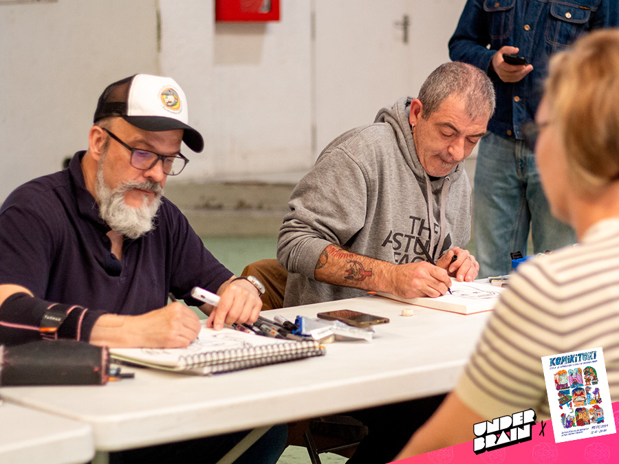 Roberto Flores y Txema Esteban realizando caricaturas durante el Komikitoki